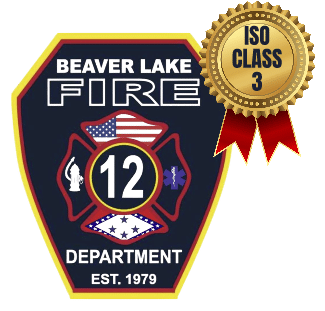 Beaver Lake Fire Department shield insignia with a central 12 and cross design, EST. 1979, and an ISO Class 3 ribbon badge overlapping the top right.